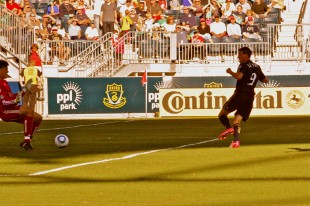 Sebastien Le Toux touches the ball past keeper Pat Onstad. (Photo: Paul Rudderow)