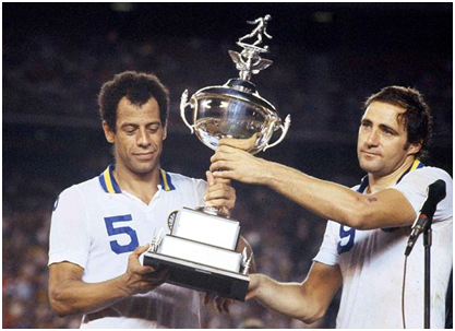 Cosmos (Carlos Alberto (l) and Giorgio Chinaglia) host the 1978 NASL trophy after bullying their way through the season