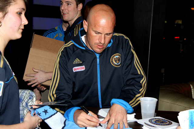 Conor Casey working hard to get signatures out