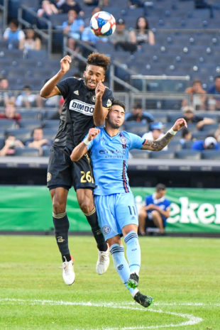 Austin Trusty out jumps Valentín Castellanos for the ball.