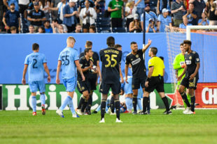 Medunjanin and Bedoya argue with the referee on penalty call on the Union, a yellow card is issued during this sequence to Ray Gaddis.