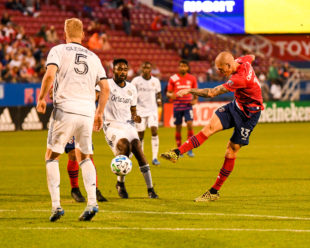 Zdenek Ondrasek take a shot at the net which results in the 1st goal of the game for FC Dallas.
