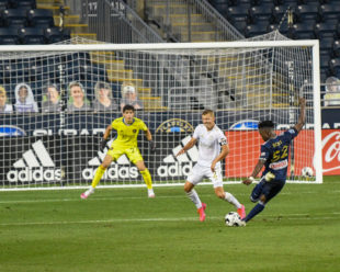 Patrick Bohui takes a shot on goal against Vicente Reyes, Making his USL Debut, during the first half of the game against Atlanta United II.