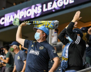 Fans stand, clap, swing scarves and make noise to get the boys in the blue through the final minutes.