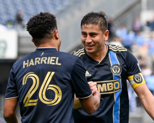 Alejandro Bedoya takes a minute to congratulate Nathan Harriel on his assist.