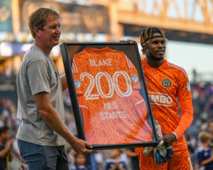 Andre Blake is presented with a jersey commemorating his 200th start with the Philadelphia Union.