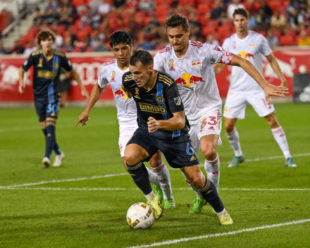 Daniel Gazdag keeps possession of the ball from defenders Aaron Long and Omir Fernandez in the second half