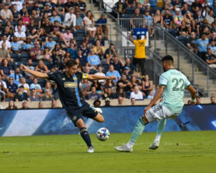 Alejandro Bedoya takes a shot on goal in the first half.