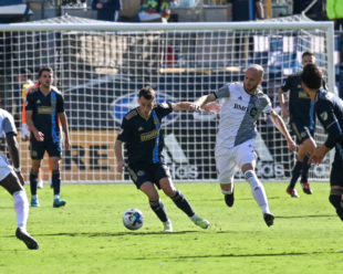 Daniel Gazdag keep Michael Bradley from the ball.