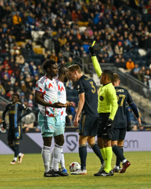 Guido Gonzales Jr, issues a yellow card to Key Kamara. This was one of 11 yellow cards during the match with 2 ending in red cards for Chicago FC.