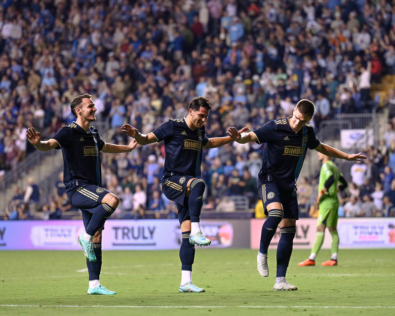 The Union's front three, Daniel Gazdag, Julián Carranza, Mikeal Uhre, celebrate together after Julián Carranza scores with an assist credited to Daniel Gazdag.