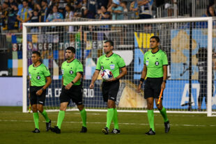 The Referee's for the match,Mario Escobar, Luis Aroldo Ventura
Humberto Panjoj, Julio Luna, take the field.Mario Escobar, Luis Aroldo Ventura
Humberto Panjoj, Julio Luna