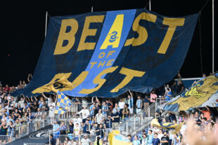 The Sons of Ben reveal the "Beast of the East" tifo before the game.