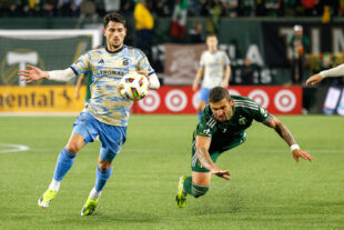 Philadelphia Union forward Julian Carranza works the ball past Portland Timbers defender Dario Župarić in the second half of the Union’s 3-1 win over the Timbers at Providence Park in Portland, Ore. on Saturday night, March 23, 2024. (Darby Winter/Special to The Philly Soccer Page)