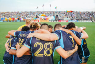 Philadelphia's starting lineup gathers together for a huddle before the game against Charlotte FC on June 22, 2024 at Subaru Park.