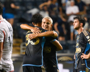 Brothers, Cavan and Quinn Sullivan share a celebratory hug after the final whistle. Cavan's first MLS pass was to his brother Quinn!