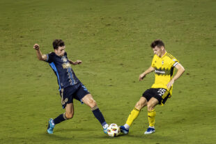 Philadelphia Union midfielder Leon Flach (left) and Columbus Crew midfielder Sean Zawadski (right) fight for the ball in the second half of the Union’s 1-0 loss to the Columbus Crew at Subaru Park in Chester, Pa. on Wednesday night, August 28, 2024. (Kyle Grantham/Philly Soccer Page)