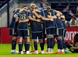 Philadelphia Union players huddle before the game.