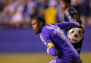 Goalkeeper Andre Blake looks for an opening to throw a pass.
