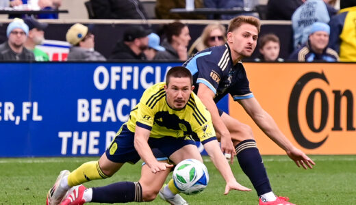 Bruno Damiani gets his foot on the ball before taking Alex Muyl down outside the box.