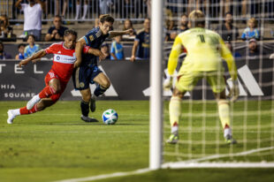 Philadelphia Union forward Milan Iloski fights for position on the ball in front of goal with Chicago Fire defender Leonardo Barroso in the first half of the Union’s 4-0 win over the Chicago Fire at Subaru Park on Saturday night, August 23, 2025.