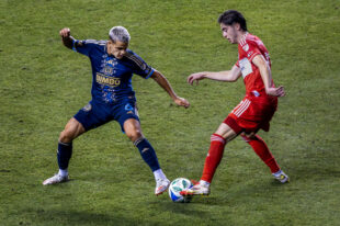 Philadelphia Union midfielder Cavan Sullivan fights for the ball with Chicago Fire midfielder Brian Gutiérrez in the second half of the Union’s 4-0 win over the Chicago Fire at Subaru Park on Saturday night, August 23, 2025.