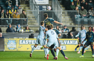 Union striker Anello rises for a header against San Jose