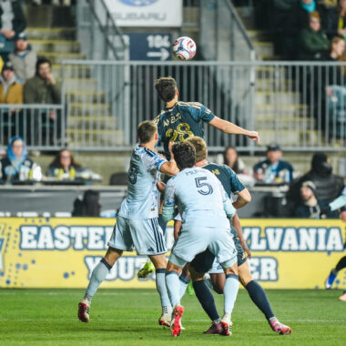 Union striker Anello rises for a header against San Jose